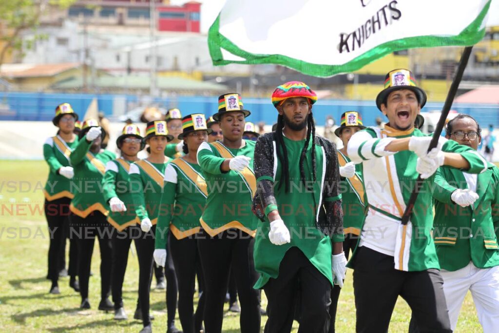 Hospital workers representing St Patricks during their march pass presentation at the SWRHA family affair at Skinner Park, San Fernando on May 27.  - Lincoln Holder