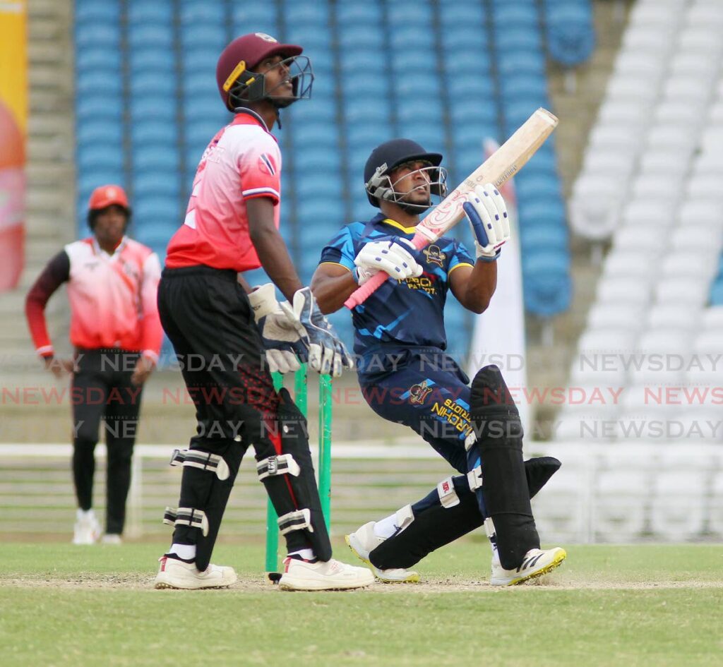 Marchin Patriots’ batsman Adrian Ali eyes the ball after playing a shot against the Premier League Under-19 team, on Saturday, during the TTCB Premier II T20 final, at the Brian Lara Cricket Academy.  - Lincoln Holder