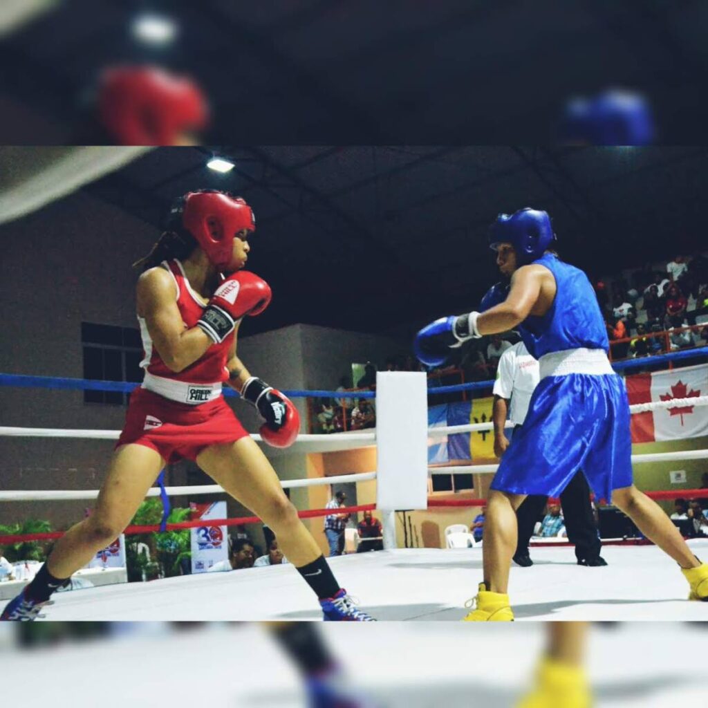 TT's Tiana Guy, left, will compete at a boxing meet in Poland. - 