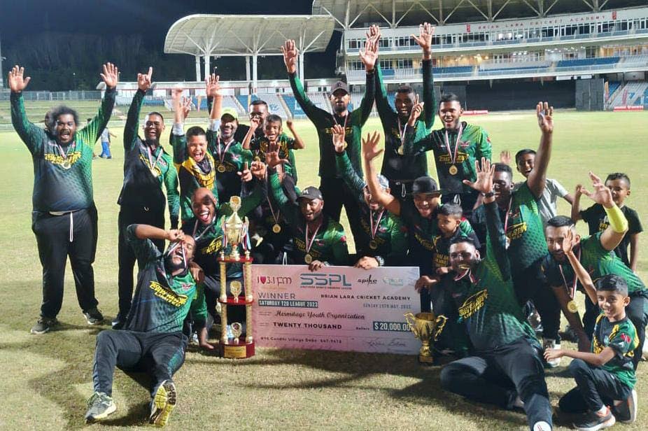 Hermitage Youths Organisation (HYO) celebrate their capture of the 103.1FM & Southern Sports T20 title at Brian Lara Cricket Academy on Sunday.  - Courtesy Southern Sports