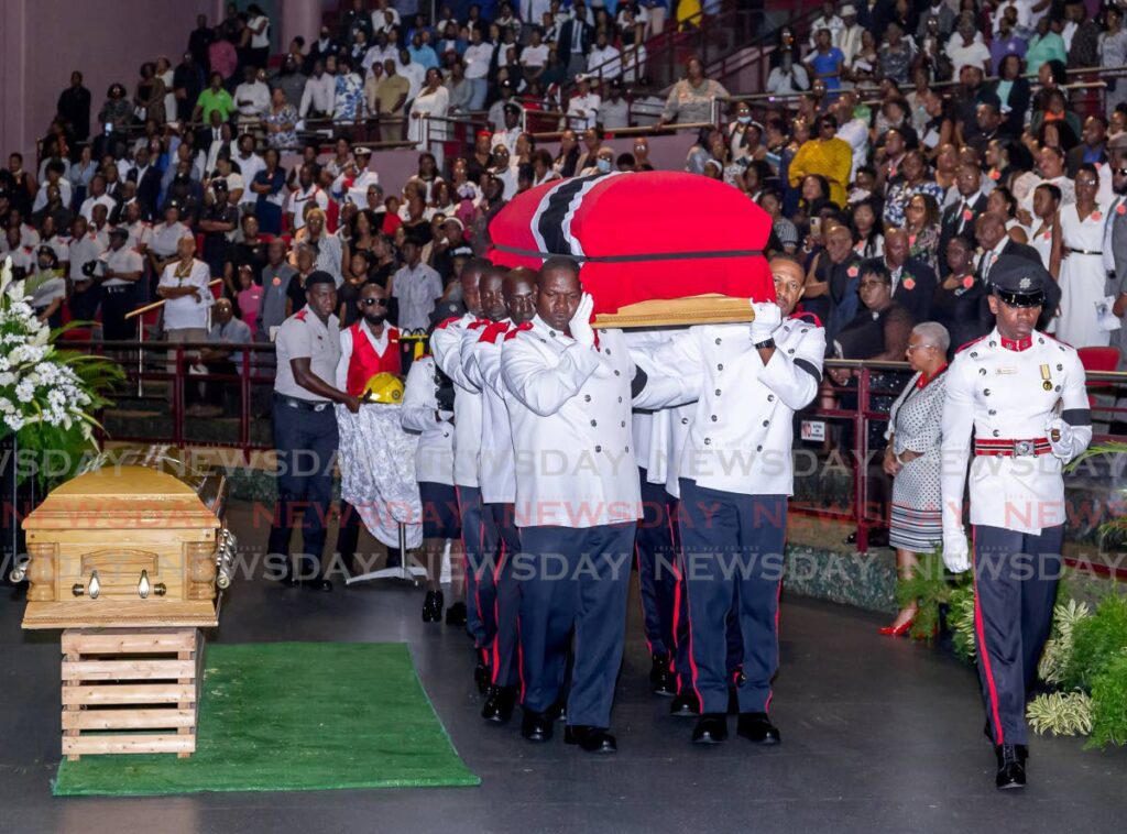 The late Christian Adams was brought in by members of the Tobago Fire Service during the funeral for him and his wife, Teresa Alleyene-Adams, at the Shaw Park Cultural Complex on Thursday. The couple died in an accident on May 18.  - David Reid