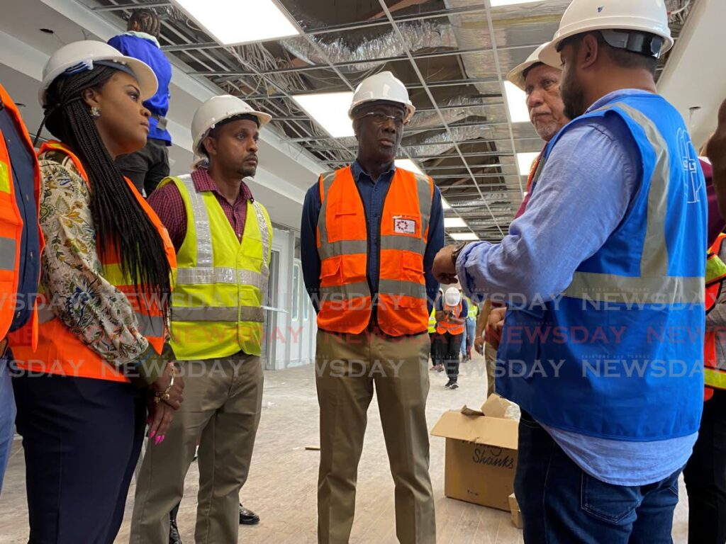 The Prime Minister and Sport Minister Shamfa Cudjoe toured the Hasely Crawford Stadium on Friday.  - Photo by Narissa Fraser