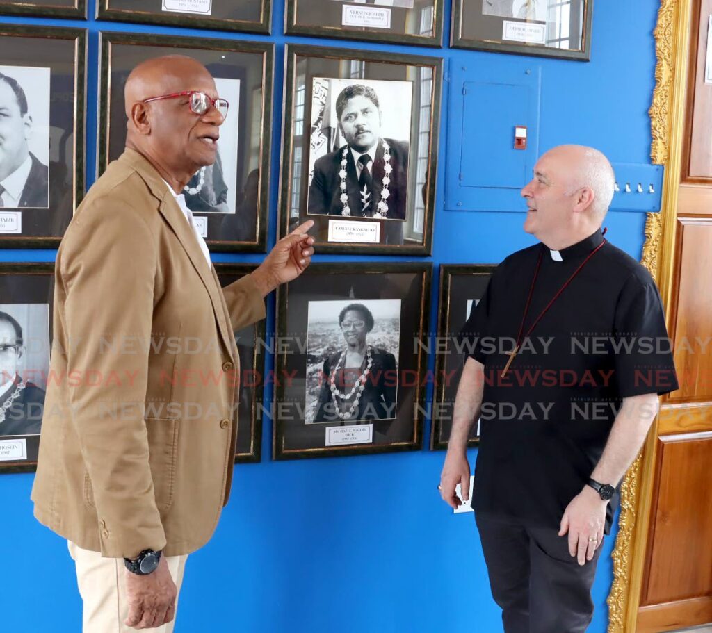 
San Fernando Mayor Junia Regrello shares the history of former San Fernando mayor Carlyle Kangaloo, the late father of President Christine Kangaloo, with Archbishop of York Stephen Cottrell during his visit to City Hall on Saturday. - Roger Jacob