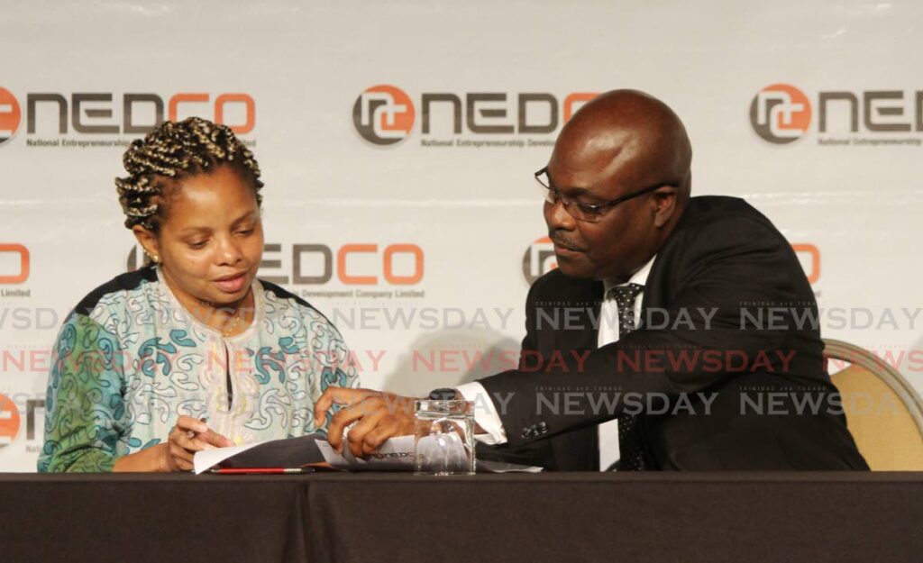 Nedco CEO Calvin Maurice and Ministry of Digital Transformation manager of performance and engagement Dr Andrea Kanneh sign a memorandum of understanding at the launch of Nedco's Business Accelerator Programme, Hyatt Regency, Port of Spain on Monday. - Angelo Marcelle