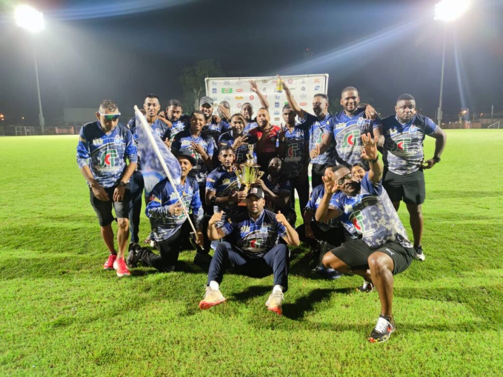 Police cricketers celebrate winning the North Zone T20 title on Sunday. - 