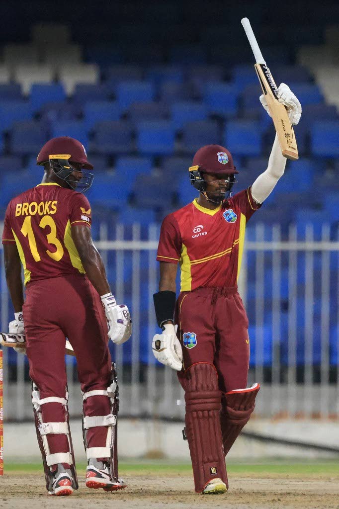 West Indies' Alick Athanaze, right, celebrates after scoring a half-century during the third one-day international against the United Arab Emirates at the Sharjah Cricket Stadium in Sharjah on Friday.  - AFP PHOTO