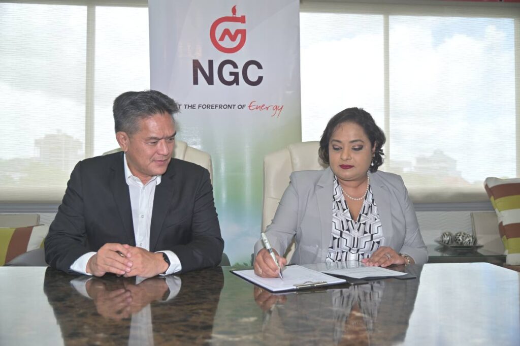 NGC president Mark Loquan signs Master Services Agreement with Priya Maharaj-Glasgow, senior director, operations, Worley Trinidad Ltd