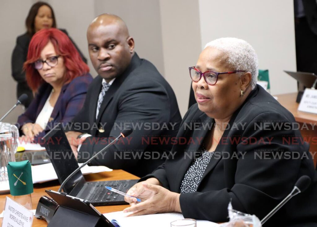 Court executive administrator, Master Christie-Anne Morris-Alleyne, right, answers questions at a Joint Select Committee on national security, Red House, Port of Spain on Wednesday. Next to her is registrar marshal Raymond Roberts and deputy court executive administrator Wendy Lewis-Callender. - Angelo Marcelle