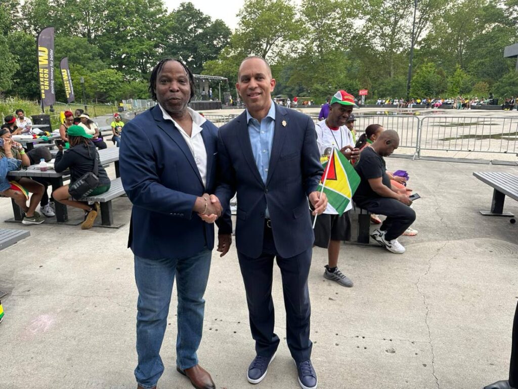 HONOURED: Attorney Keith Scotland and Democratic Leader in the United States House of Representatives, Congressman Hakeem Jeffries at Guyana's Independence celebrations, at Prospect Park, Brooklyn, New York on June 11. 
 - 