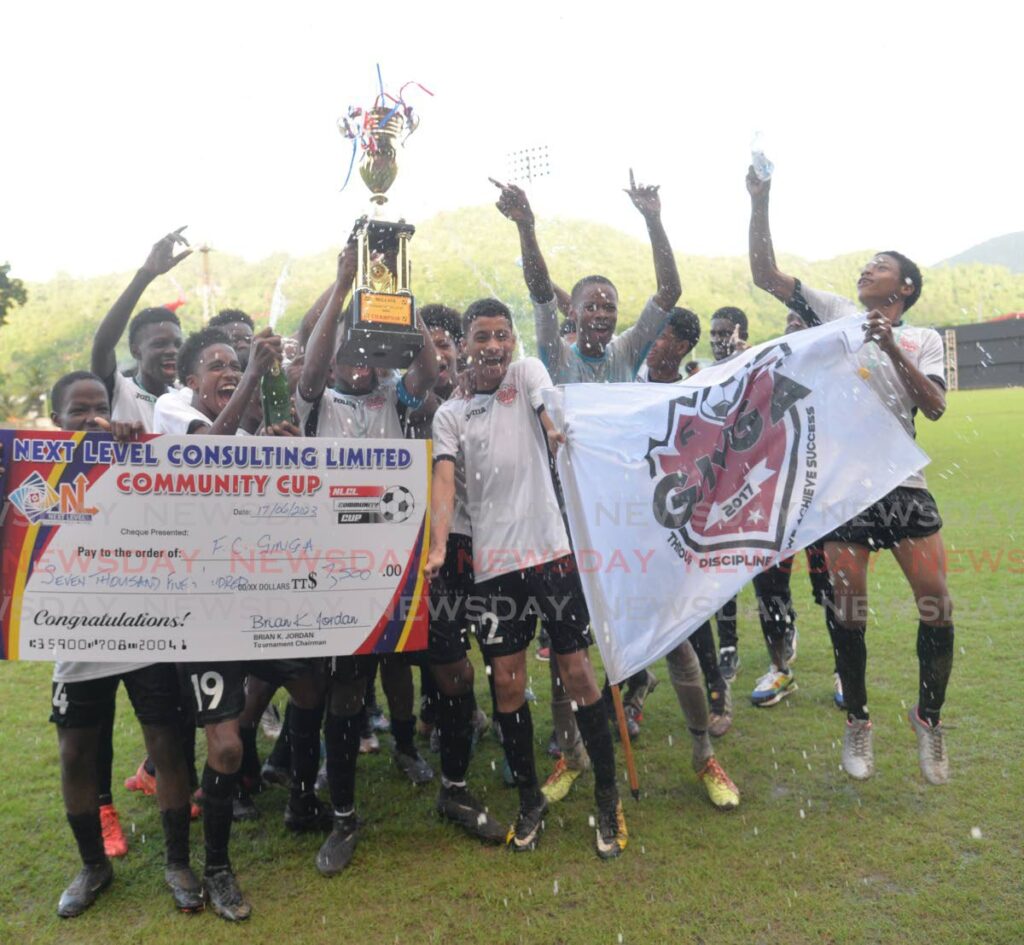 FC Ginga players celebrate after winning the NLCL Under-15 Community Cup on Saturday. FC Ginga defeated Trendsetter Hawks via penalties at the Diego Martin Sporting Complex, Diego Martin.  - Anisto Alves