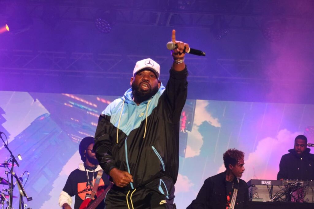 Corey “Raekwon The Chef” Woods holds the mic out to the crowd to illicit their response during the Wu Tang Clan’s performance @calirootsfest. Woods came to Trinidad for his birthday a few years ago and shared an insightful story about his experience. - Overtime Media