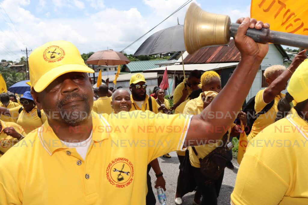 A member of the Contractors and General Workers Trade Union during the Labour Day march in Fyzabad on June 19. - 