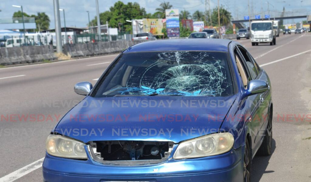 A pedestrian, believed to be homeless, was hit by this car  while crossing the Churchill Roosevelt Highway, near Courts, El Socorro, San Juan, on Monday. - Anisto Alves