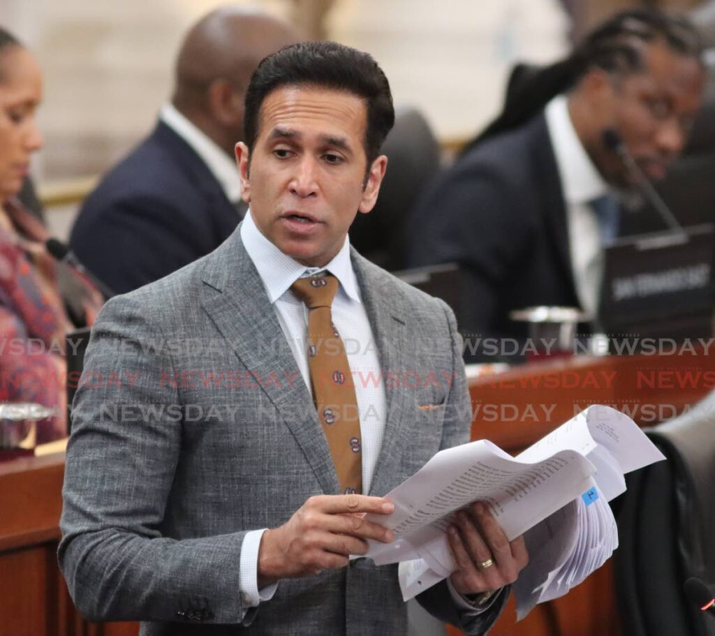 Acting Attorney General Faris Al-Rawi contributes to the House of Representatives in Parliament on Tuesday. - Angelo Marcelle