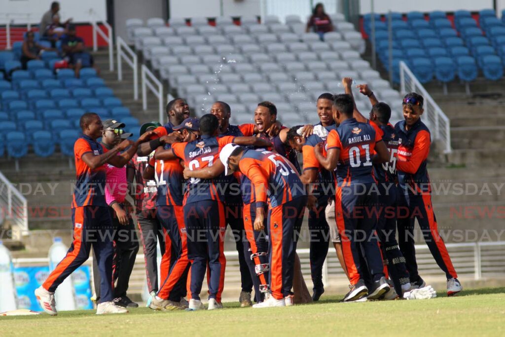 Cocrico Cavaliers players celebrate after winning the TT Cricket Board Dream XI Trinidad T10 Blast title, on Saturday, after an eight-wicket win in the final against the Soca Kings, at the Brian Lara Cricket Academy, Tarouba.  - Lincoln Holder