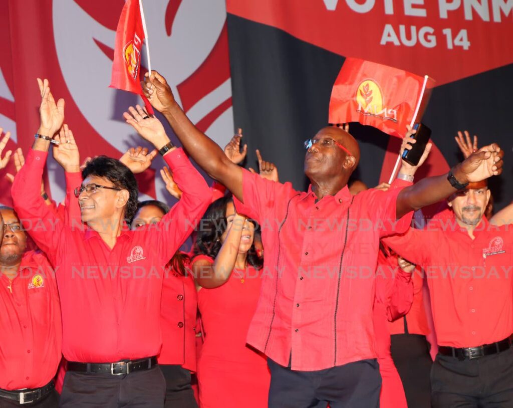 RED AND READY:
PNM Political Leader and Prime Minister Dr Keith Rowley dances at the party’s special convention to present its 141 local government election candidates at NAPA, Port of Spain on Sunday. - Angelo Marcelle