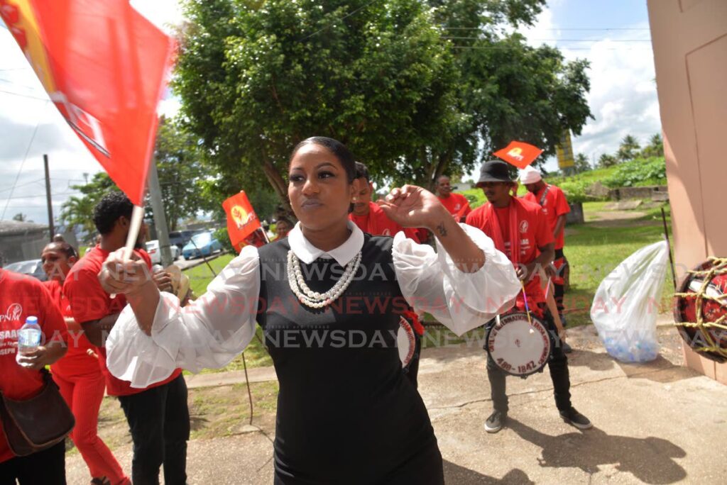 People National Movement candidate for Valsayn /St Joseph, Aviea Reanna Isaac celebrate with her supporters at the Real Spring Community Centre, SWWTU Avenue, Valsayn South, after filing her nomination papers for the Local Government Elections on Monday. - Photo by Anisto Alves