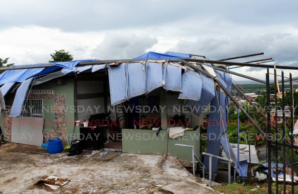 The damaged roof of a house in Green Acreas Road, Trou Macaque on Wednesday after a thunder storm on Tuesday. - Anisto Alves