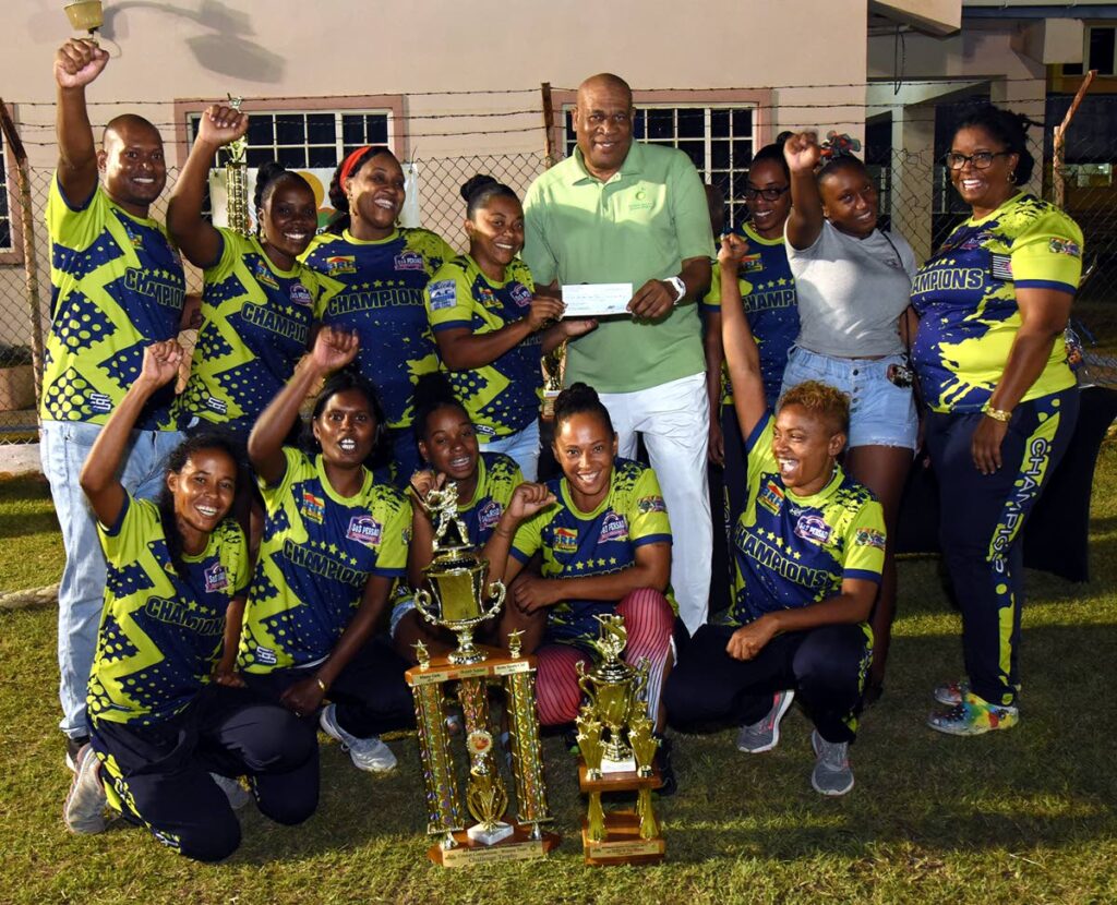CHAMPIONS: Women's league and knockout winners Champions, celebrate their double victory with Matthew Pierre, community liaison coordinator, bpTT. - Courtesy CJ Communications