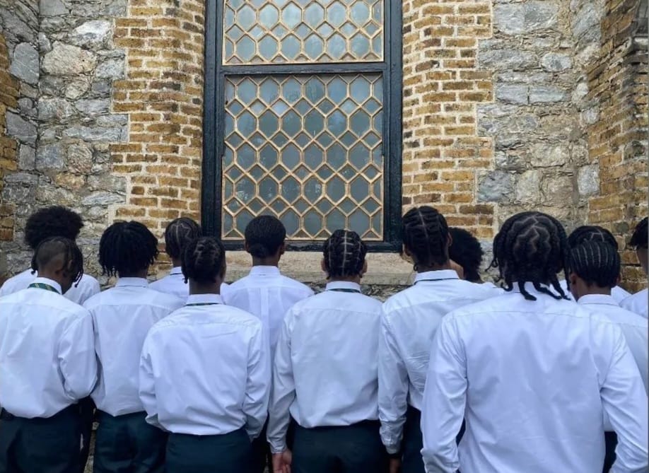 Trinity College, Moka, students stand outside their graduation ceremony at All Saints Church, Marli Street, Port of Spain. -