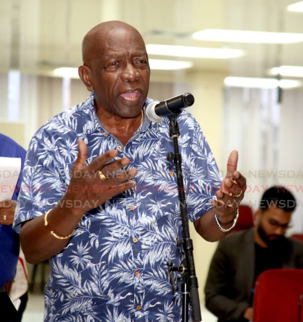 Jack Warner speaking at a Regulated Industries Commission consultation on a proposal to electricity rates at Centre of Excellence, Macoya in January. - File photo