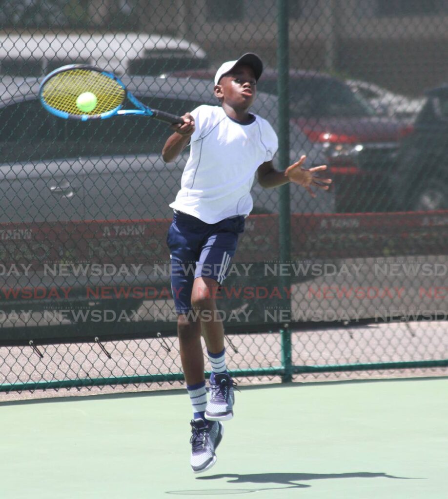 In this March 4 file photo, Josiah Hills plays a shot in his match against Jacob Jacelon, in the Catch National Junior Championship Boys under 12 match, at the National Racquet Sports Centre, Tacarigua . - Angelo Marcelle
