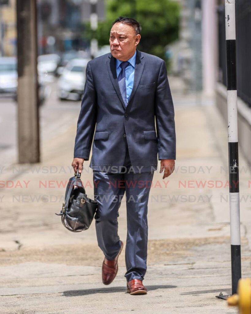 Opposition chief whip David Lee on his way to Parliament in May. - Jeff Mayers