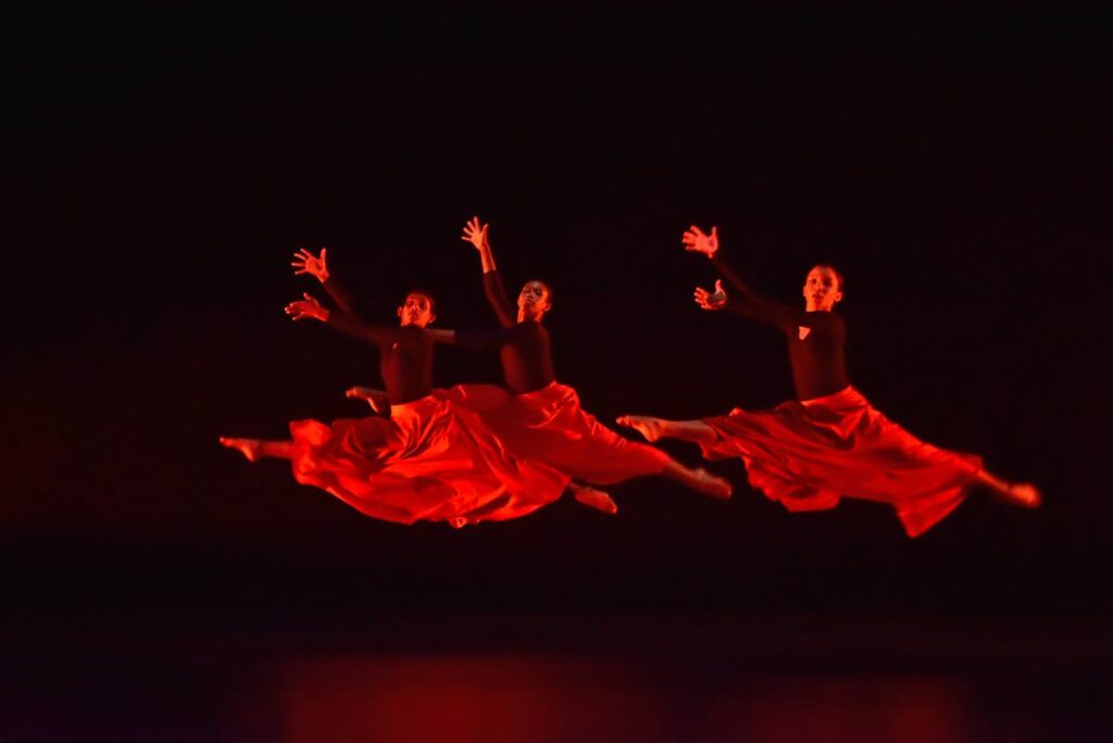 Members of Metamorphosis Dance Company preforming on stage. Photo courtesy Metamorphosis Dance Company. - 