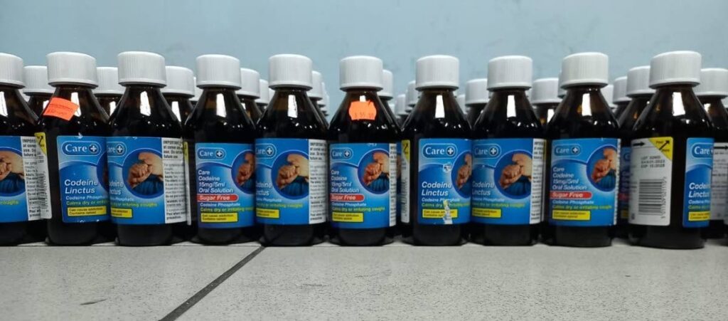 Bottles of Codeine Linctus seized by police who arrested two UK nationals at a bread-and-breakfast accomodation in St James.  - 
