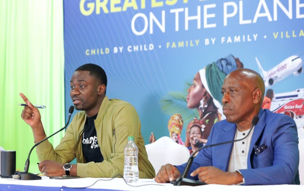 THA Chief Secretary Farley Augustine and Secretary of Infrastructure, Quarries and Urban Development Trevor James address residents during a town hall meeting in Calder Hall on July 4. - Photo courtesy THA