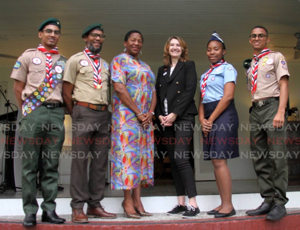 Minister of Planning and Development Pennelope Beckles and British High Commissioner Harriet Cross, centre, with, from left, international Scouts commissioners Jeremiah Dookhoo and Mark Ainsley John, Melody Wilson, and national youth commissioner Nikoli Mohammed during a reception for Chevening alumni and youth climate change leaders, in Maraval.  - Ayanna Kinsale