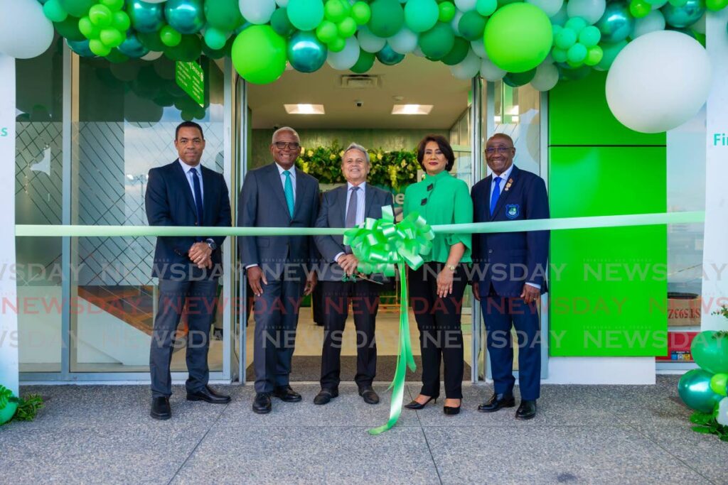 (l-r) First Citizens Group deputy CEO business generation Jason Julien, First Citizens chairman Anthony I Smart, Finance Minister Colm Imbert, Group CEO Karen Darbasie, and Mayor Sigler Jack, cut the ribbon at the new First Citizens West Vale branch
(Photo courtesy First Citizens) - 
