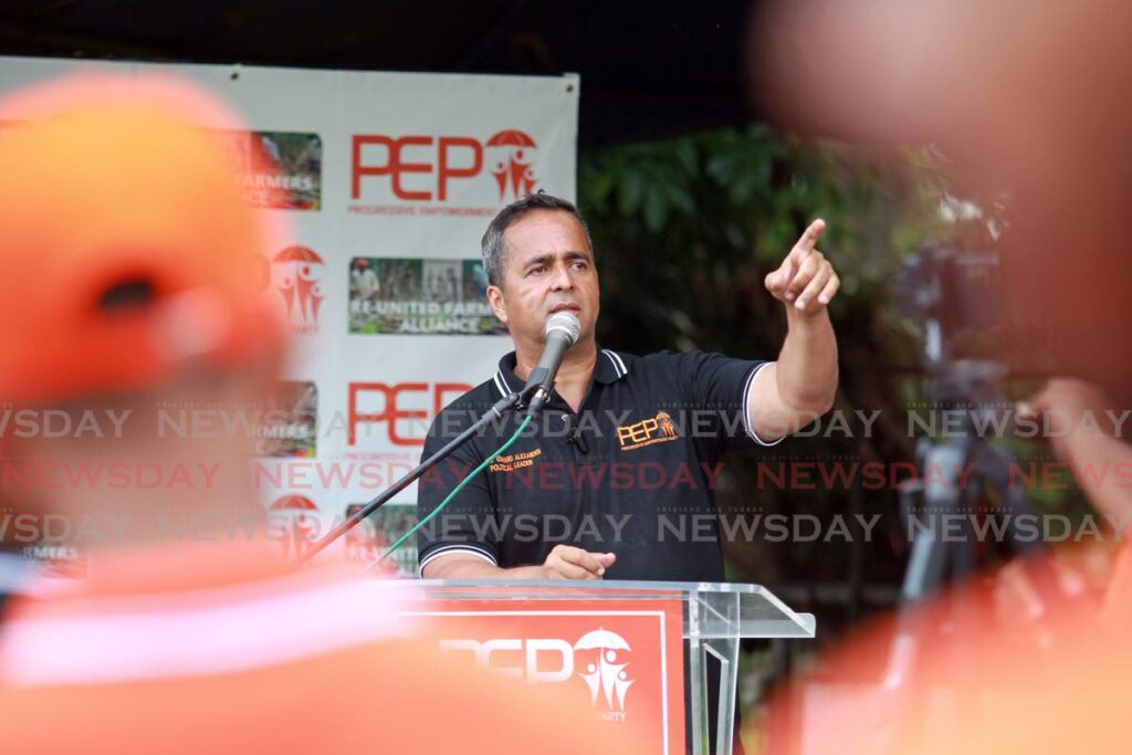 Political leader of the Progressive Empowerment Party (PEP) Phillip Alexander speaks at political rally at Palmiste Park after a motorcade on Saturday. - Lincoln Holder