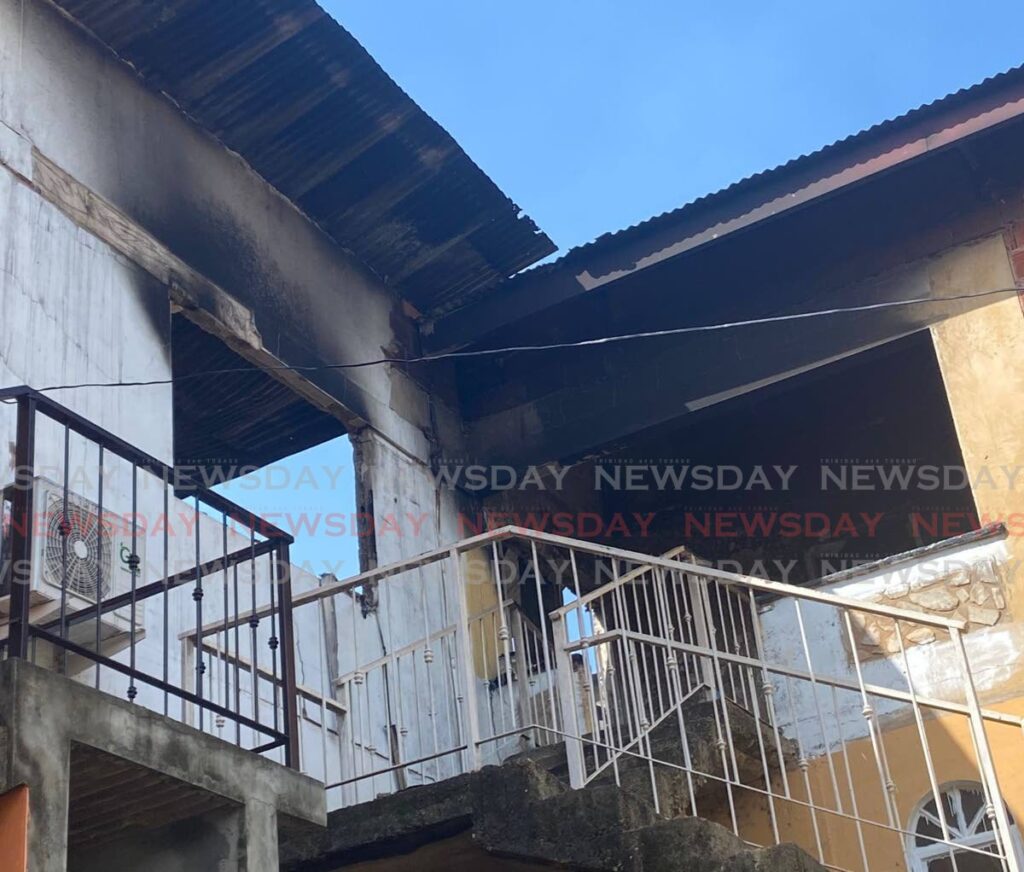 House set on fire in Morvant. - Photo by Narissa Fraser