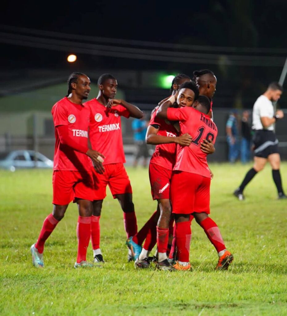 Rangers players celebrate after scoring against Police FC during the TT Premier Football League Knockout tournament match, on Tuesday night, at the Diego Martin Sporting Complex on Tuesday night. - TTPFL