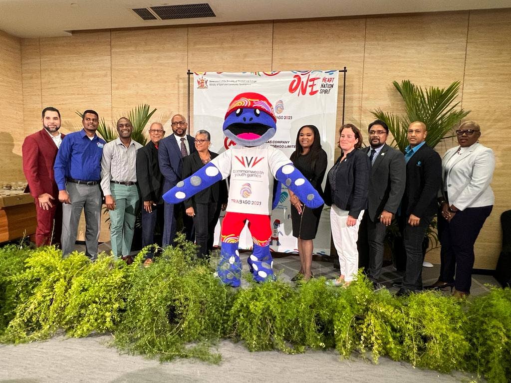 From left, Guardian Life's Gregg Mannette, Blue Waters' Avinash Lallo, Lanher CEO Sean Roach, local organising committee chairman Douglas Camacho; NGC's Myles Lewis; TTCGA chairman Diane Henderson; Games mascot Cocoyea, Sport Minister Shamfa Cudjoe; Commonwealth Games Federations' Annie Hairsine; Proman's Fazad Mohammed; Republic Bank's Sherwin Forte and Tourism Trinidad CEO Carla Cupid.   - Courtesy CYG committee