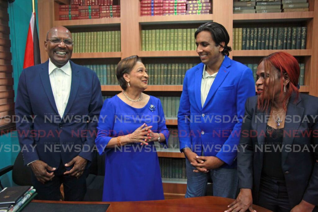 From left: Oppostion Senator Wade Mark, UNC Political Leader Kamla Persad-Bissessar, UNC activist Ravi Balgobin Maharaj and Senator Jerlean John at a  media conference at Persad-Bissessar's Siparia constituency office, Penal, on Friday.  - Lincoln Holder