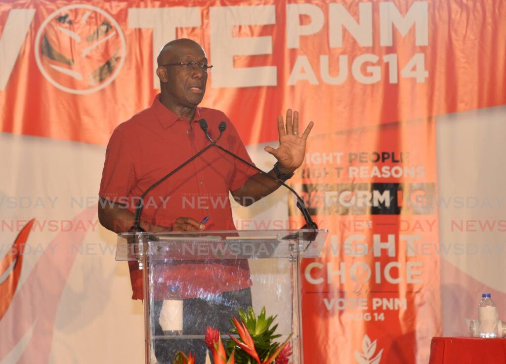 Prime Minister Dr Keith Rowley speaks at a PNM public meeting at Hillview College, El Dorado, on Thursday night. - Anisto Alves