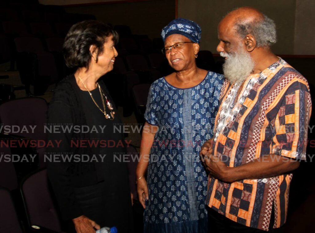 Joan Samaroo, wife of Prof Brinsley Samaroo, left, speaks with Dr Asha Kambon and head of the Emancipation Support Committee Khafra Kambon during Samaroo’s memorial service at the University of the West Indies, St Augustine, Daaga Hall Auditorium on Friday. 