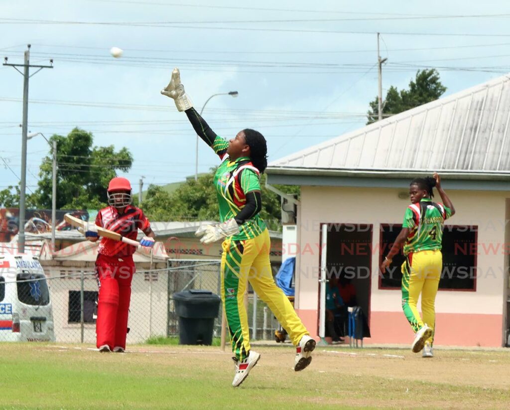 Winward Islands wicket keeper Schey-Ann Gaymes makes a catch in their match against TT during the final, on Saturday, of the West Indies U19 Women's Rising Stars Championship, at the Sir Frank Worrell Memorial Grounds, St Augustine. - 
