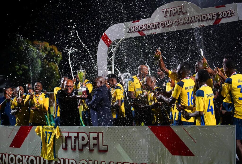 Defence Force FC celebrate after beating La Horquetta Rangers, on Saturday, in the final of the Trinidad and Tobago Premier Football League Knockout competition final, at the Diego Martin Sporting Complex, Diego Martin. - TT Premier League