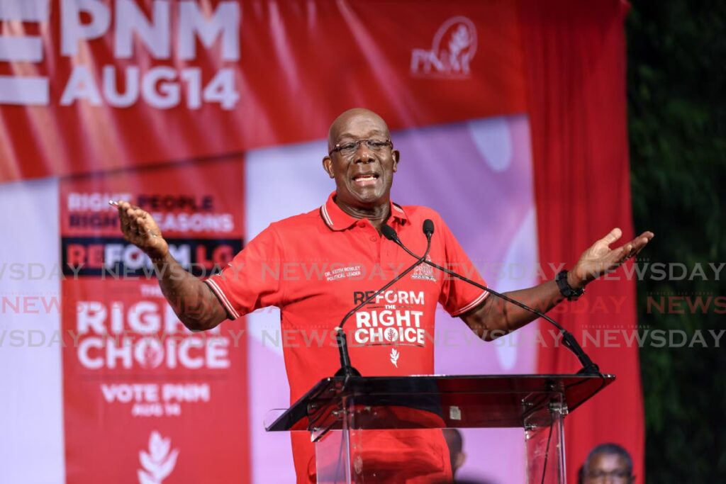 Prime Minister Dr Keith Rowley addresses supporters at a PNM meeting at Harris Promenade, San Fernando on July 15. - Jeff Mayers