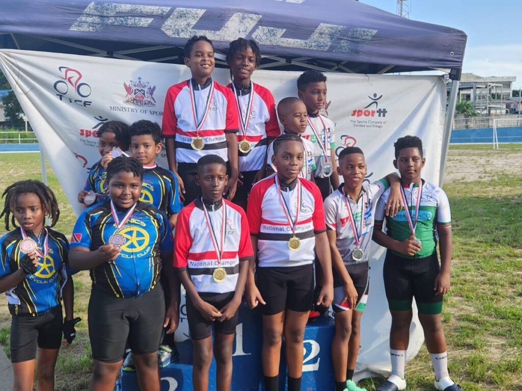 Young cyclists celebrate their team sprint podium performances at the Youth National Track Cycling Championships at Irwin Park, Siparia, over the weekend.   - 