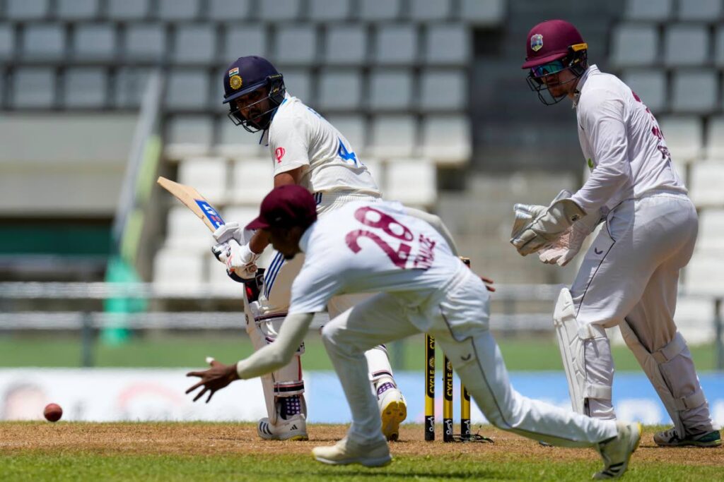 India's captain Rohit Sharma eyes the ball after playing a shot against West Indies on day two of their first Test match at Windsor Park in Roseau, Dominica, on Thursday.  - AP PHOTO