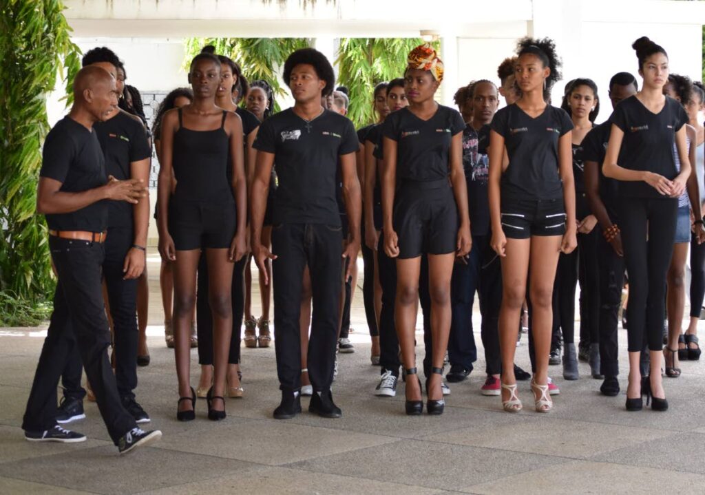 Christopher Nathan, left, conducts CVI Fashion Workshop runway techniques session. - 