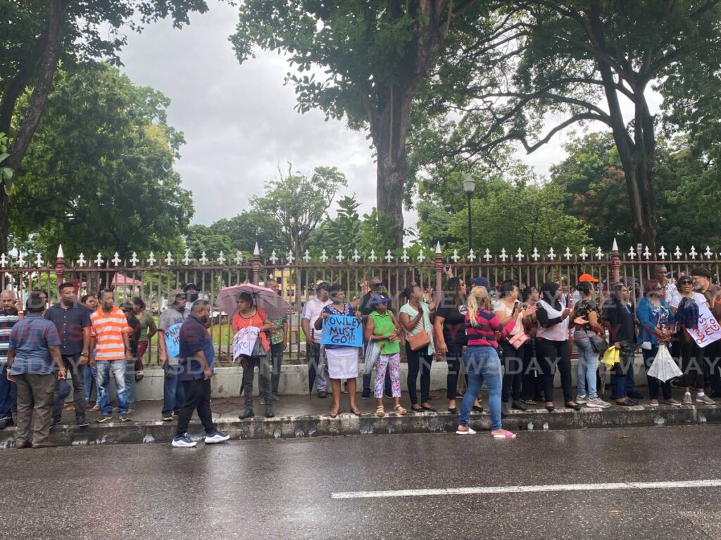 Protesters protested outside the Parliament on Wednesday afternoon ahead of an extraordinary sitting of the House of Representatives to debate the Public Procurement and Disposal of Public Property (Amendment and Validation) Bill, 2023. - Narissa Fraser