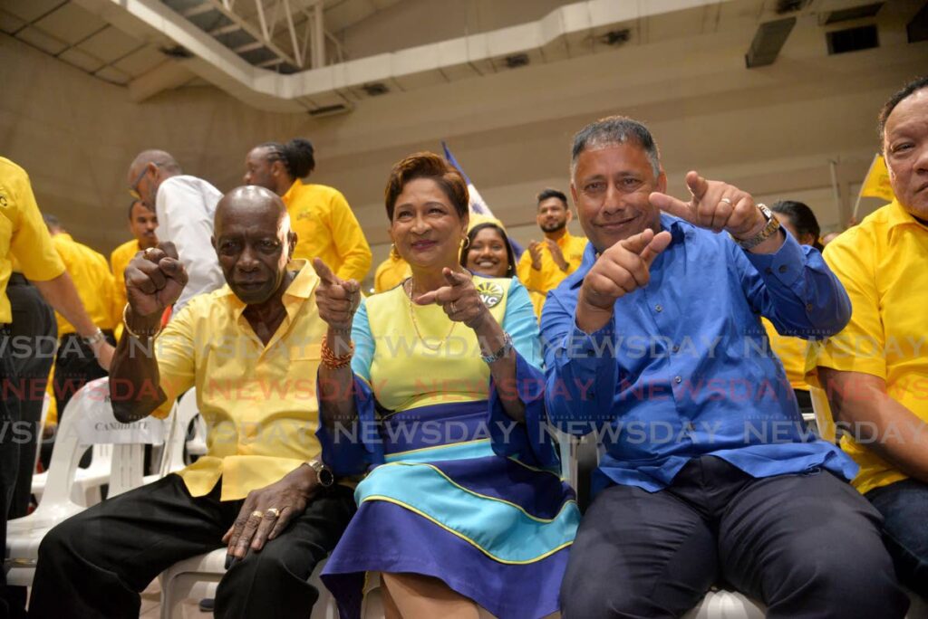 From left, Jack Warner, UNC Political Leader Kamla Persad-Bissessar and NTA Political Leader Gary Griffith at a joint political rally at the Centre of Excellence, Macoya, on Monday. - Photo by Anisto Alves