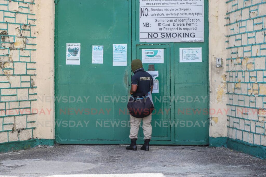 An officer outside the Port of Spain Prison on Frederick Street. FILE PHOTO/JEFF MAYERS - 