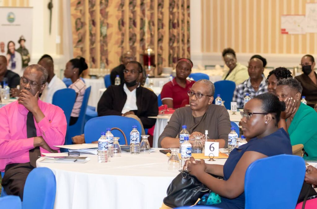 Stakeholders attentively listen to presentations on the national workplace policy on sexual harassment at Magdalena Grand Resort, Tobago. 
(File photo) - David Reid
