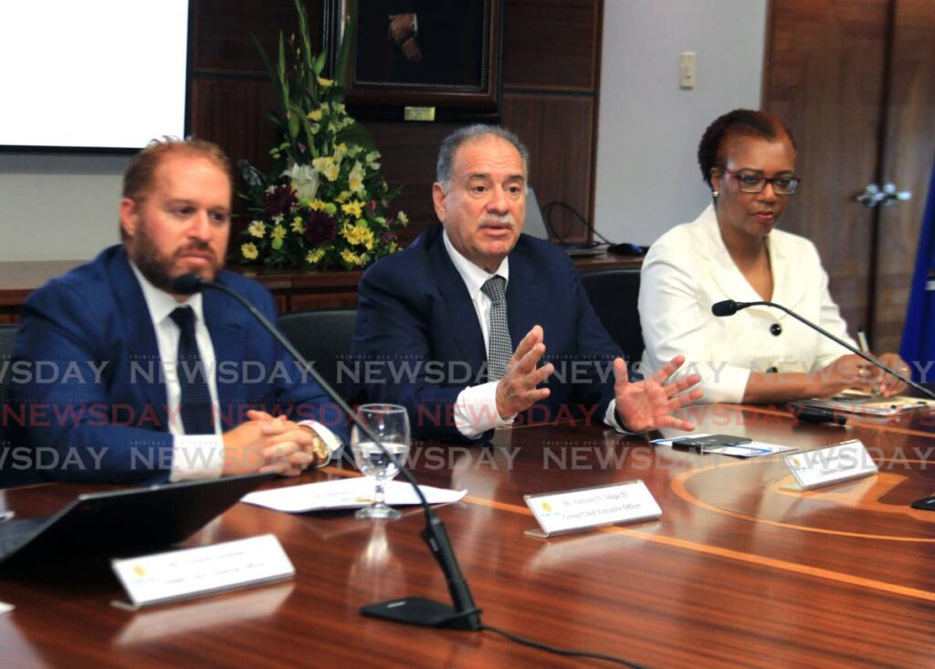 Ansa McAl group of companies chairman A Norman Sabga (centre) flanked by CEO Anthony N Sabga III (left) and chief legal and external affairs officer Frances Bain-Cumberbatch, speaks during the group's financial results at the Tatil Building, Maraval Road, Port of Spain. 
(File photo/ Ayanna Kinsale) - AYANNA KINSALE